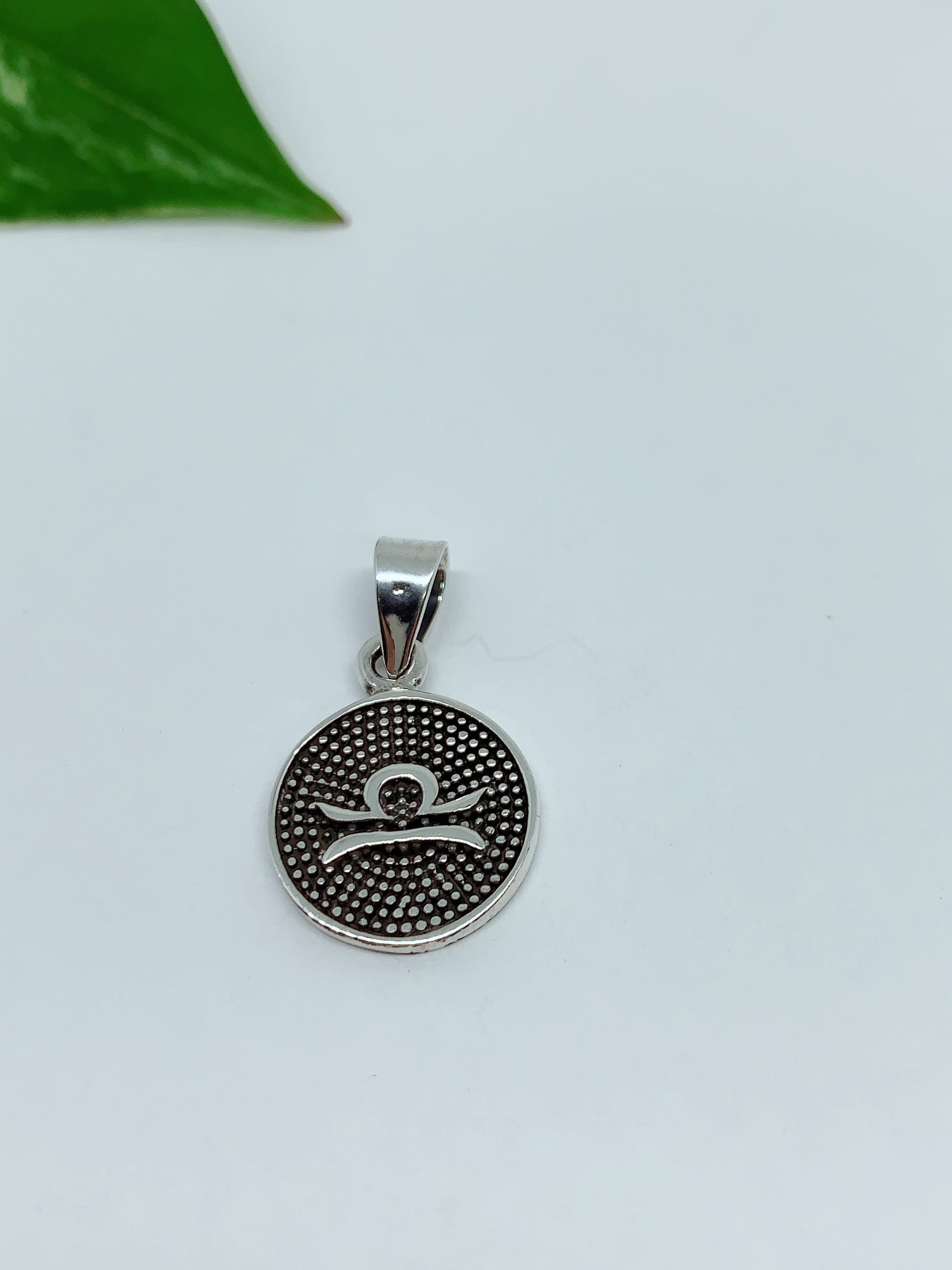 Sterling silver pendant zodiac sign