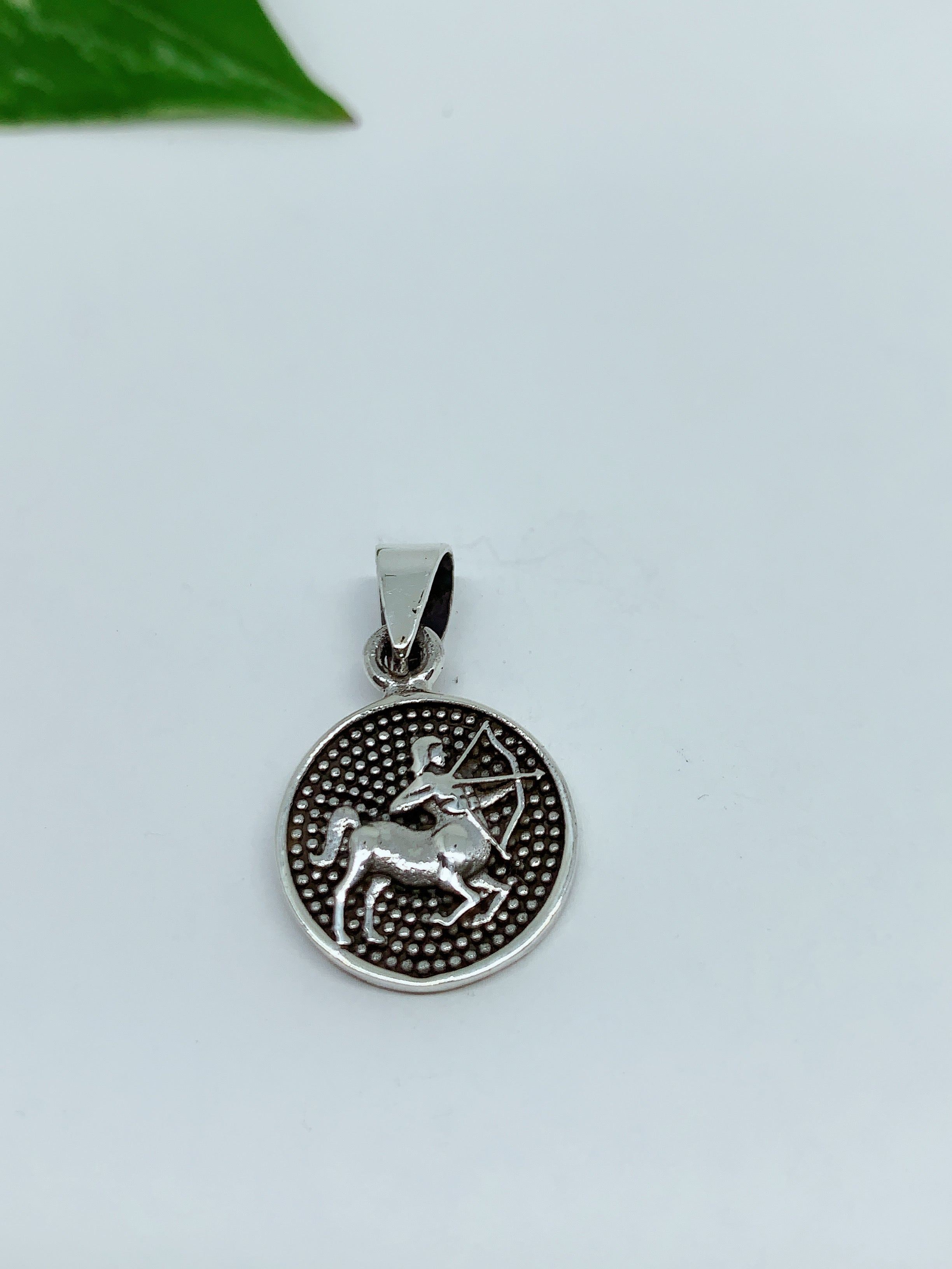 Sterling silver pendant zodiac sign