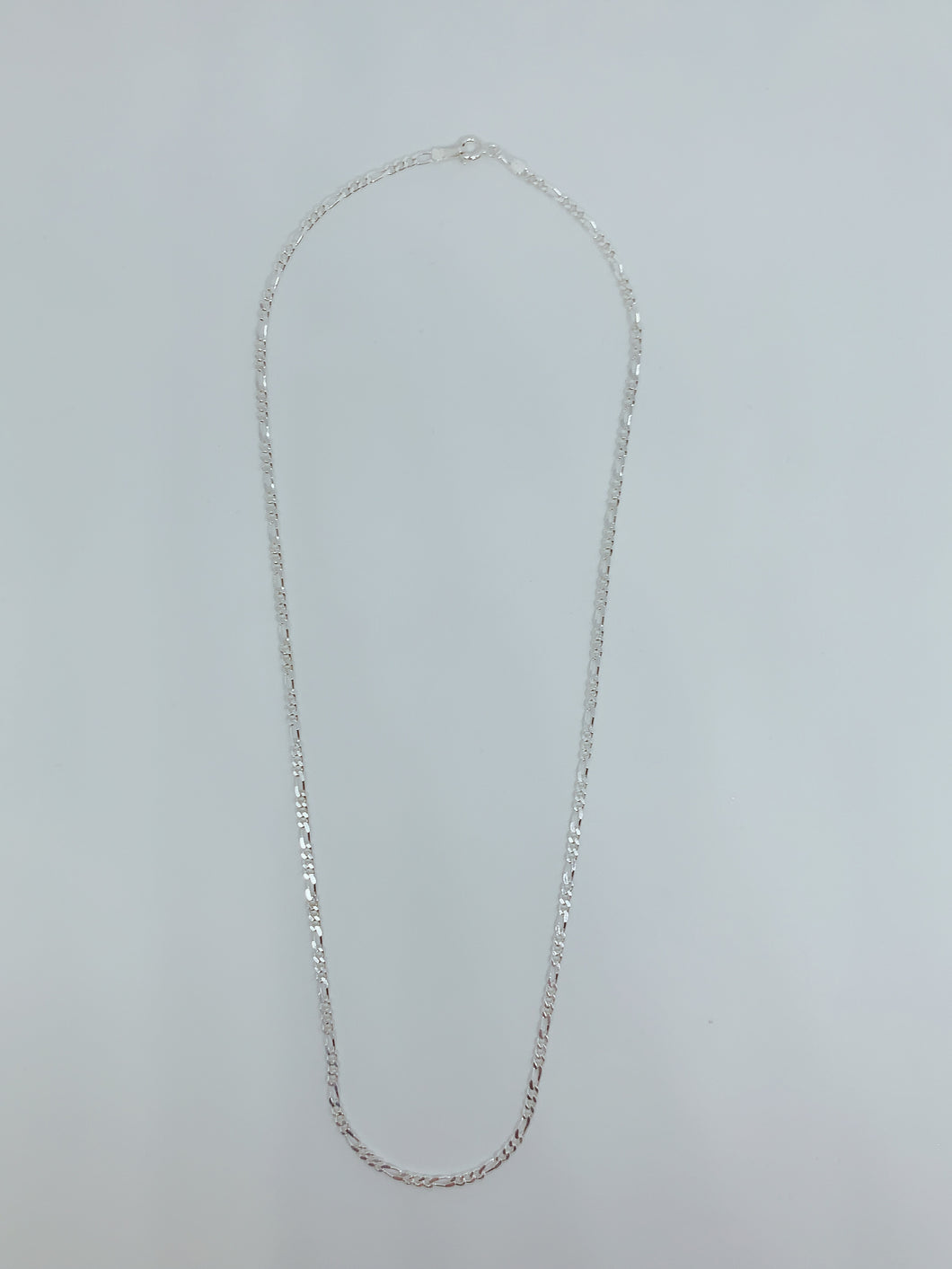 Sterling silver chain with figaro design