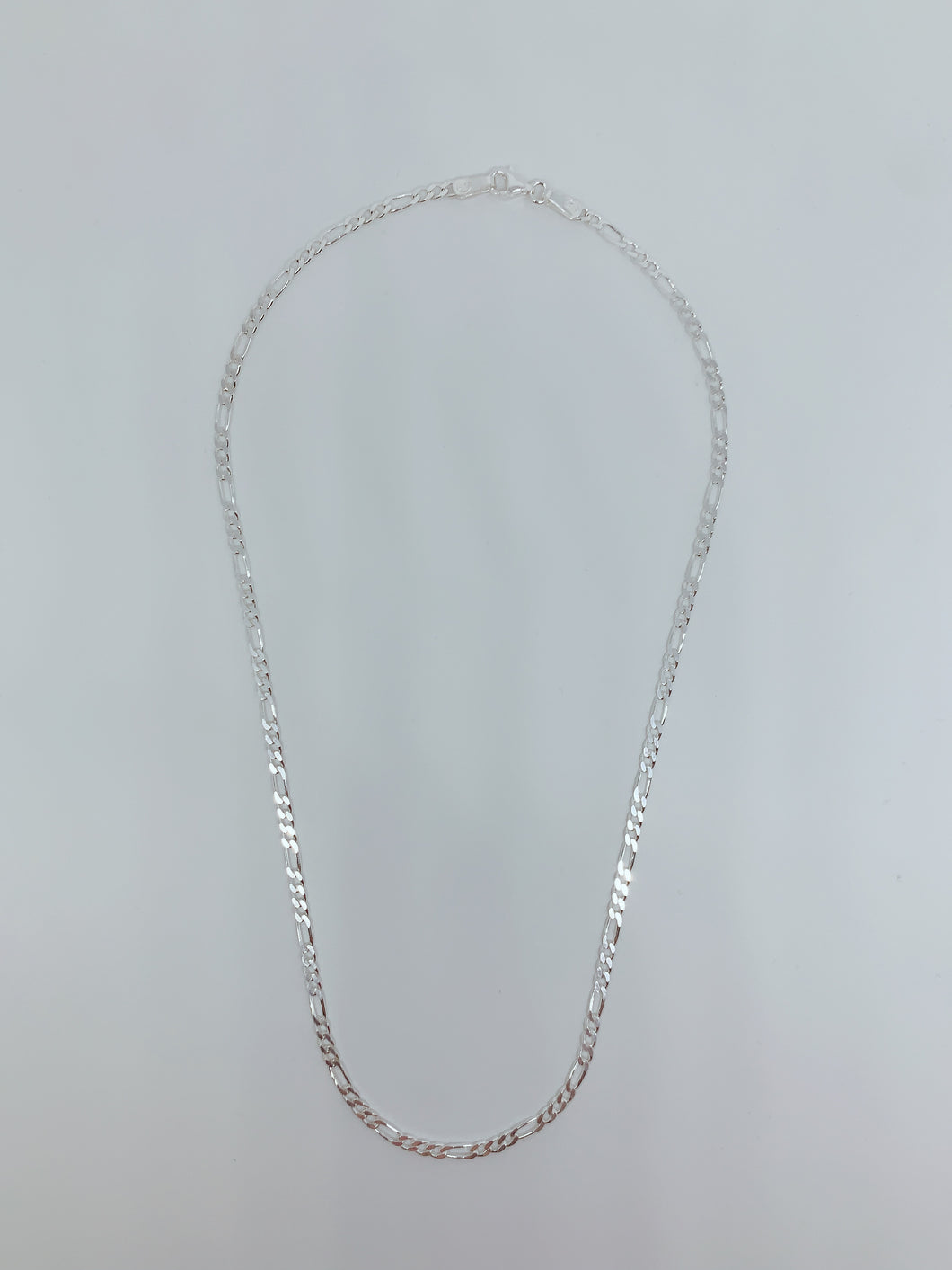 Sterling silver chain with figaro design